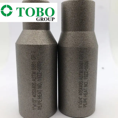 O aço de liga forjado ASTM do titânio dos encaixes de tubulação B861 GR2 2" x 1" liga do titânio de SCH10S x SCH40S estampa o bocal